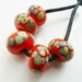 Handmade lampwork glass beads, orange raku set