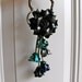 Carri's black leather flower key ring & bag hanker