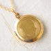 1950s vintage / round gold filled locket // BOY SILHOUETTE