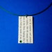 Hunger Games Pendant. Katniss and Peeta. Reversible Wordsmith Necklace. Upcycled Literature Collage. Latex Coated Stainless Steel.