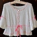 Little Bo Peep Shrug Crocheted Cotton Jacket Sugar White Pink Ribbons Roses Cream Antique Lace