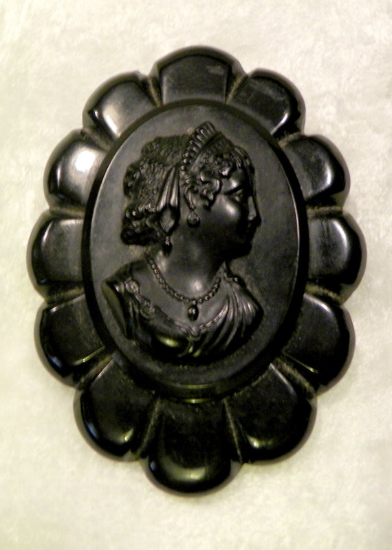 Vintage Black Carved Bakelite Cameo Brooch by DownInTheBasement