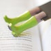 Lime green rainboots. Children , teacher gift .Legs in the book. Unusual art bookmark. Funny neon gift. oht