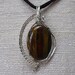 Tiger Iron and Sterling Silver Wire Wrapped Pendant