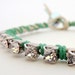 Rhinestone friendship bracelet / white / green / silver