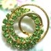 Green Rhinestone And Gold Spiraling Brooch-Pin-Vintage