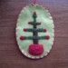 Needle Felted Oval Christmas Ornament Feather Tree on Light Green Wool Felt