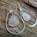 Sea glass jewelry, Frosted white sea glass dangle within sterling silver teardrop earrings