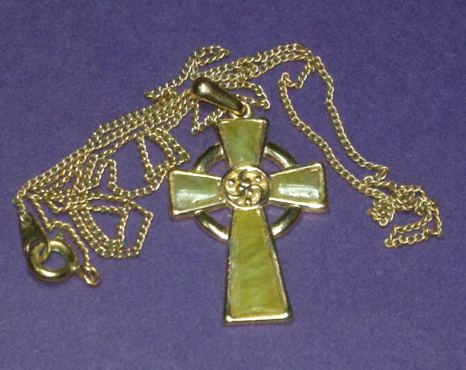 Celtic cross pendant by Miracle Solder in what appears to be olive jade