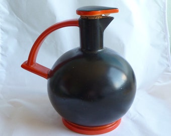 Vintage retro black and orange carafe decanter