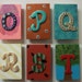 colorful handpainted wood alphabet magnets, unique patterns and finishes