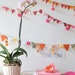 pink, orange & white garland with hanging orange dots