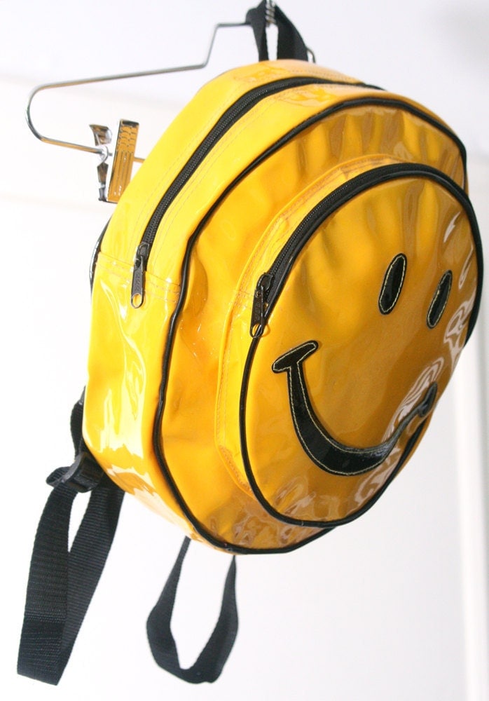 Download RAD Shiny Yellow 90s Smiley Face PVC Backpack