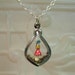 Small Terrarium Garden Gnome sitting on Amanita Mushroom Pendant