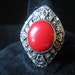 SALE Vintage Adjustible Ring has Red Oval Cabochon in Diamond Shaped Setting with Carved Design effect.