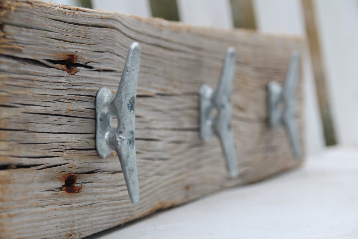 Nautical coat rack with boat cleats made from reclaimed wood