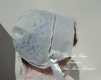 Heirloom Baby Bonnet Embroidered with light blue Riboons and flowers great gift for baby showers Christening and Dedications