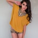 Boxy mustard top with bib
