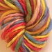 Bright rainbow chunky spun fun. Handspun art yarn. Hand dyed and hand spun Pure Australian 21 micron merino.