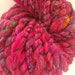 Mulberry jumble - Bulky Art skein merino with sari silks . Hand spun, hand dyed yarn. Australian merino with sari silk.