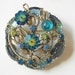 Vintage rivoli rhinestone brooch- teal green peacock glass stones