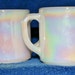 2 60's FireKing Iridescent white coffee cups