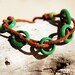 Mint green glass rings leather bracelet with african button. BLK002