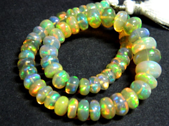 AAA.Ethiopian Opal Smooth Roundel beads A by GemsPebblesandBeads