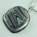 Fordite Pendant ..."Peaceful Touch"