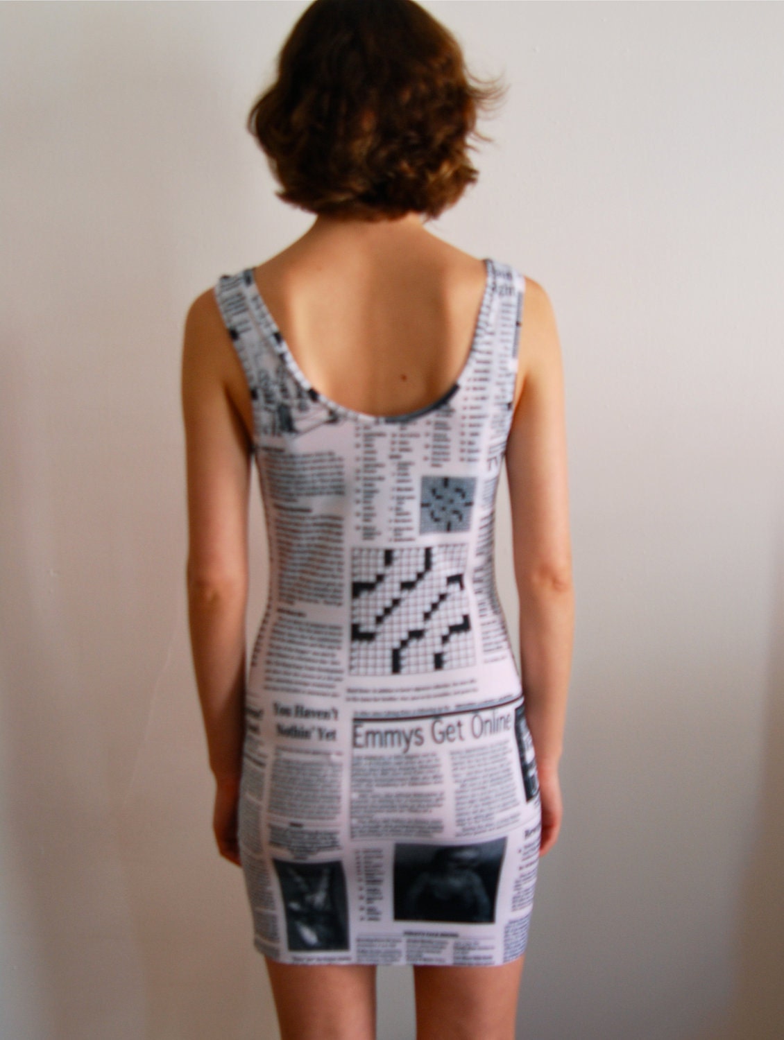 Women Newspaper print Dress with scoop back.