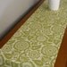 table runner in blockprint blossom green