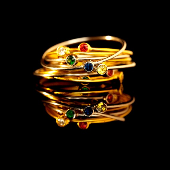 Items similar to Thin Stacking Rings - Set of Three - Delicate Gold