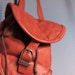 Leather backpack in bright brown orange
