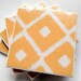 The Bonster: Set of 4 Orange Diamond Tile Coasters