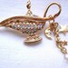KIRKS FOLLY genie lamp gold tone brooch/pin with AB rhinestones