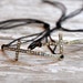 Elegant sideways cross bracelet