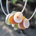 Sea glass and puka shell hoop earrings