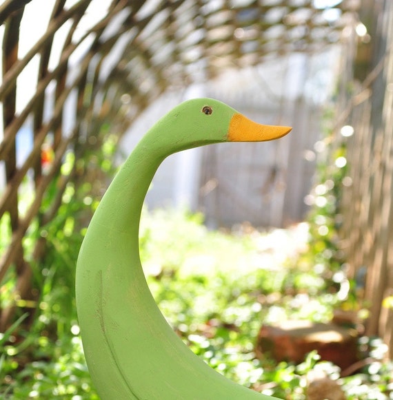 vintage wooden goose statue for garden display in bright green