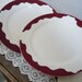 Vintage Set of 4 French Small PLUM RED PLATES, white with plum red scalloped edges, stamped in Digoin Sarreguemines.