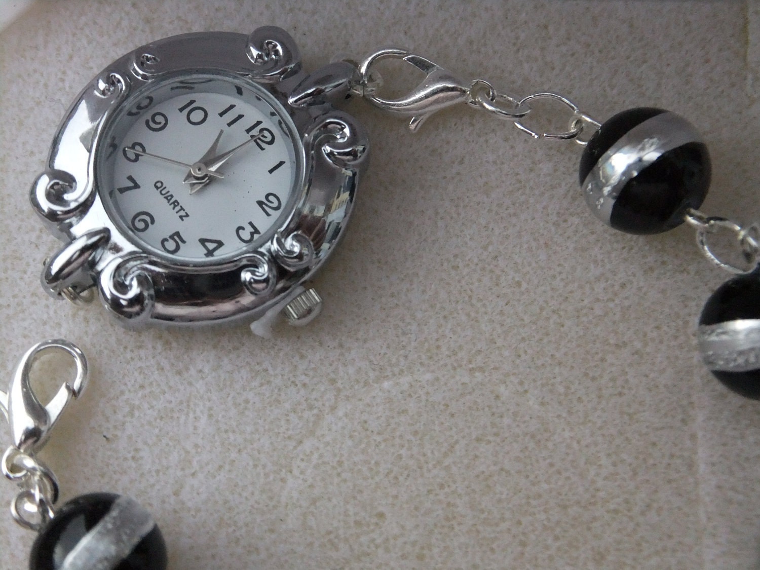 Ladies black and silver bracelet watch by Gemsations26 on Etsy