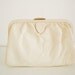 Vintage 50s tan leather clutch/ crinkled champagne leather purse/ beige bag by Calderon