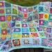 Kaleidoscope crocheted afghan kaleidoscope granny squares multi-colored with sea green (turquoise/aqua) border MADE TO ORDER