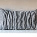 Grey knitted pillow