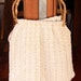 Vintage 1950s Crocheted Handbag with Cane Handles.