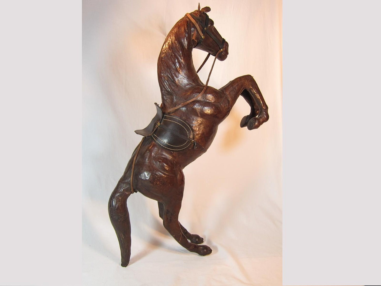 leather covered horse figurine