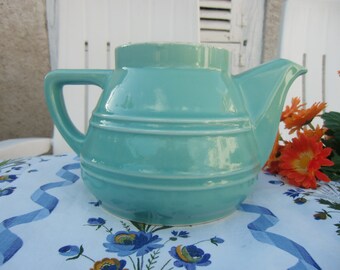 vintage french jug in delicate watery green color
