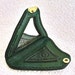 Broken mirror encased in jade green croc embossed leather.