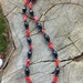 Coral Created with Hematite Stone and Glass Necklace
