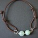 Amazonite, light green, beads in brown leather cord