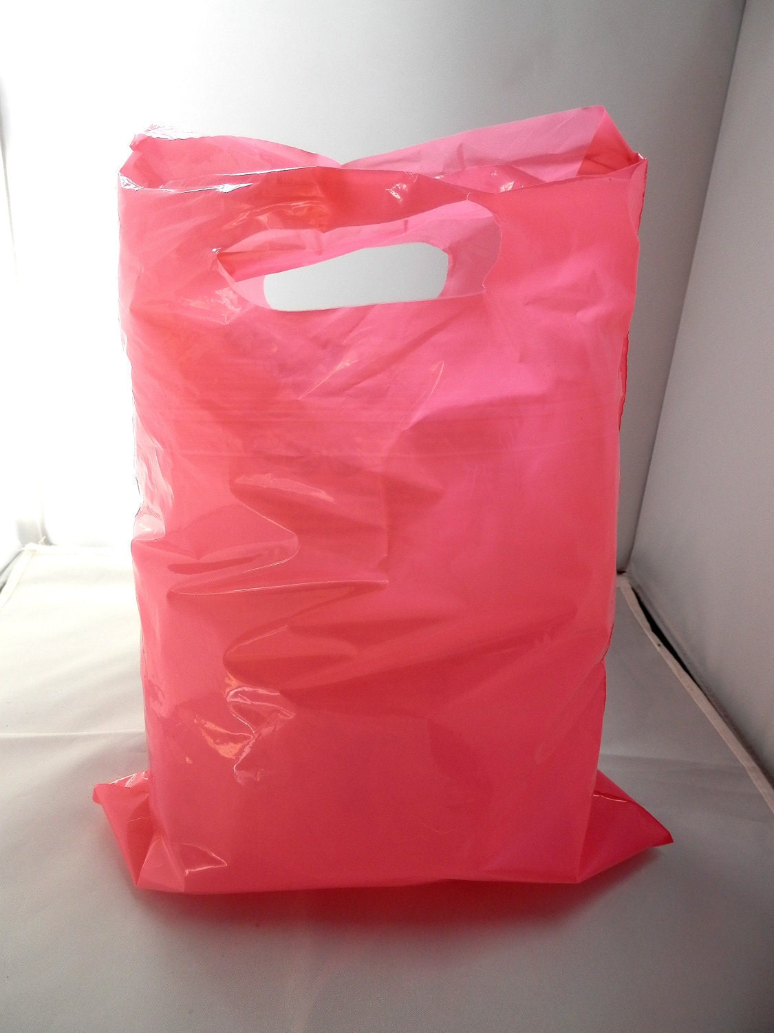 pink pvc bag